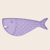 Close-up of Farm To Pet goldfish-themed lick mat for cats and small dogs, showing textured surface for licking and bonding.