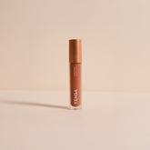 YENSA Luxe Lip Nourishing Oil with hyaluronic and vitamin E, featuring a clear lip oil bottle with a minimalist design.