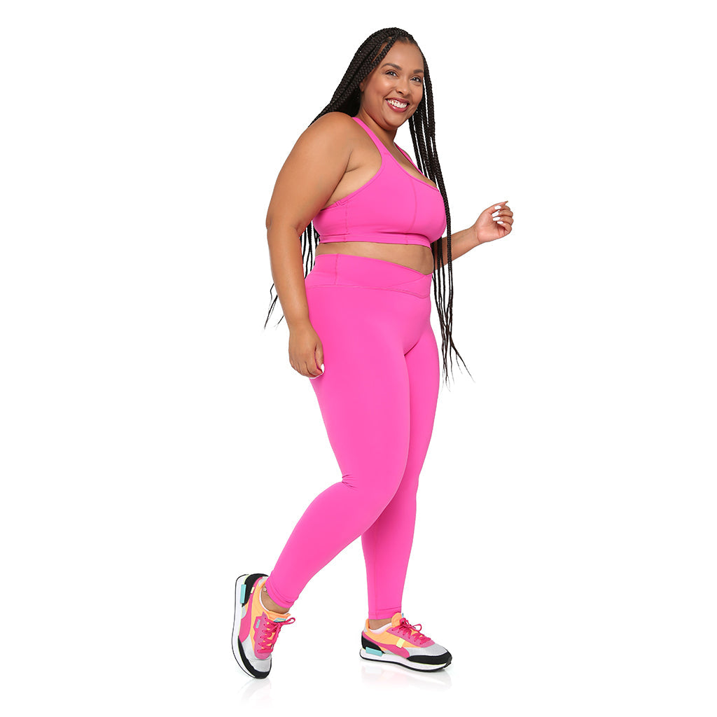 SmoothFit Crossover Leggings by Fitkitty Culture featuring a high-waist design and sleek crossover details in black fabric.
