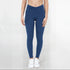 Black SmoothFit Crossover Leggings by Fitkitty Culture, stretchy athletic leggings for yoga and active wear, shown on a model.