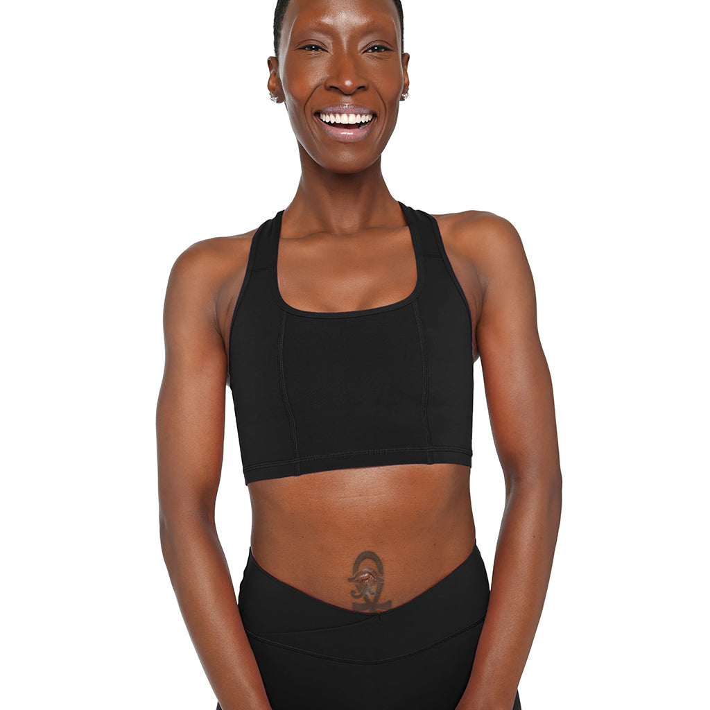 Black Fitkitty Culture SmoothFit full coverage sports bra, supportive athletic wear for women, shown on a model.