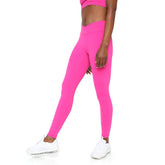 SmoothFit crossover leggings by Fitkitty Culture, showing black high-waist yoga leggings with a crossover waistband.