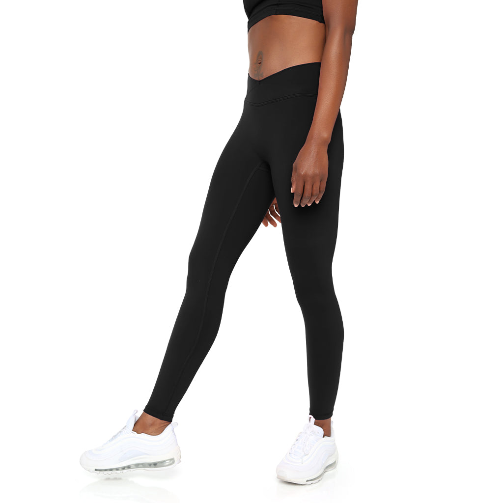 Black SmoothFit Crossover Leggings by Fitkitty Culture, stretchy yoga and athleisure wear for women, shown on a model.