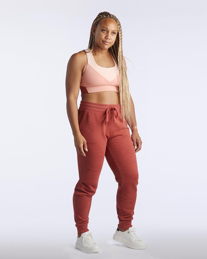 Goal Five Freasy Jogger in cinnabar color, lifestyle image showing comfortable, stylish joggers with a relaxed fit and modern design.