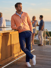 White Water Life Freeport Pant in navy with orange accents, showcasing versatile performance pants with a relaxed fit and durable fabric.