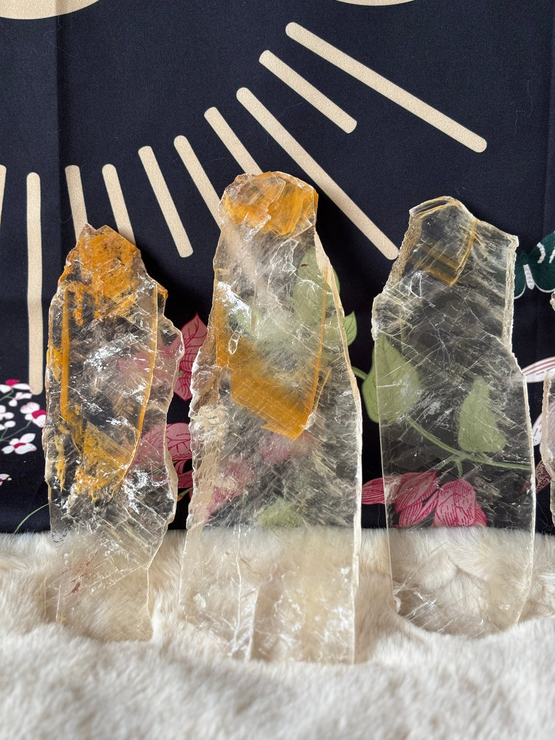 Raw Gold Phantom Selenite crystal from Evermore Everlasting with shimmering golden and white translucent mineral formations.