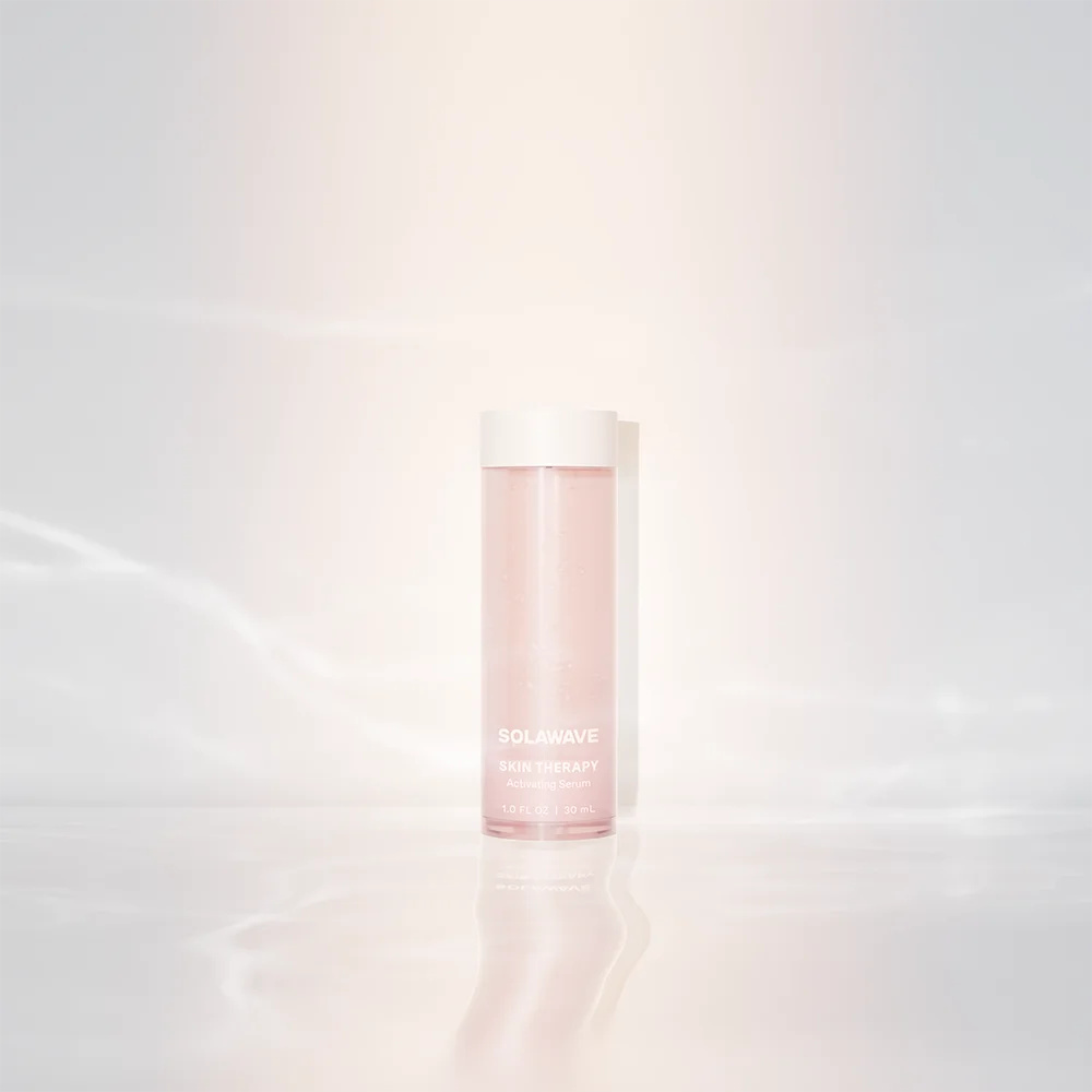 Solawave Skin Therapy Activating Serum refill pod, brightening skincare topical for glowing skin in a sleek container.
