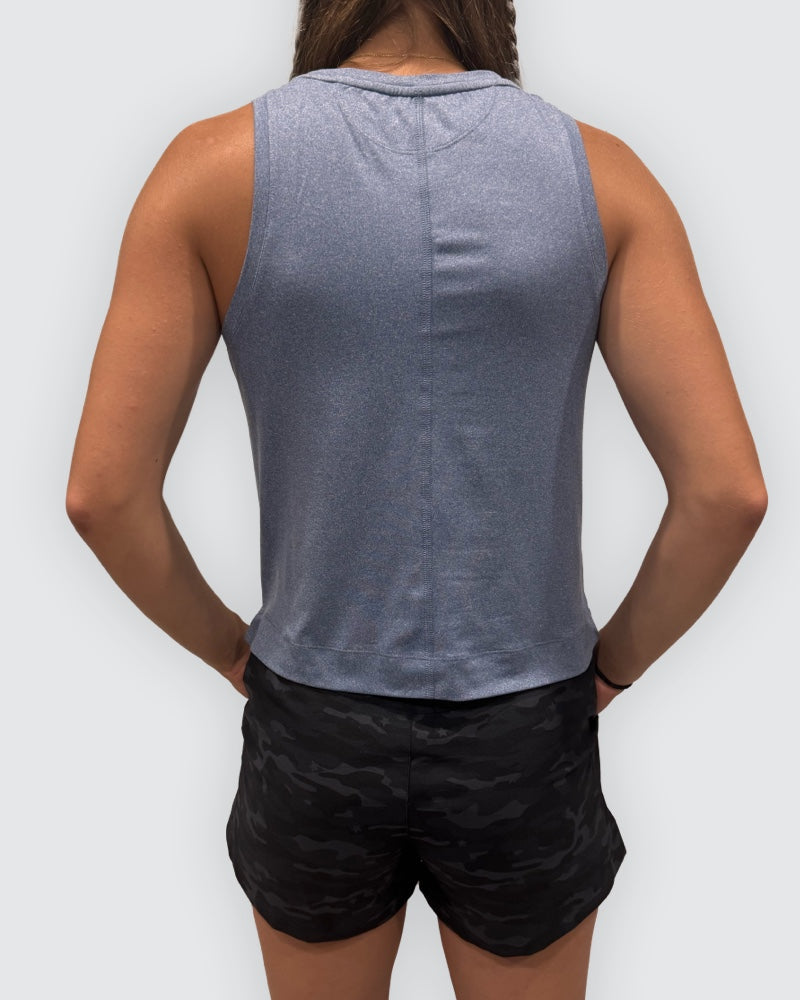 Goal Five blue boxy crop tank top shown from the back, featuring a relaxed fit and sleeveless design.