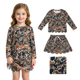 Girl wearing a long sleeves brown camo scallop top and skirt set by Mini Rodeo, stylish casual outfit for girls.