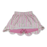 Pink floral elastic waist scallop girl skirt by Mini Rodeo, featuring a cute scalloped hem and floral pattern for kids.