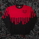Front view of Any Means Necessary Clothing Gloomy Drip Knit Sweater showing dark, textured knit fabric and relaxed fit.