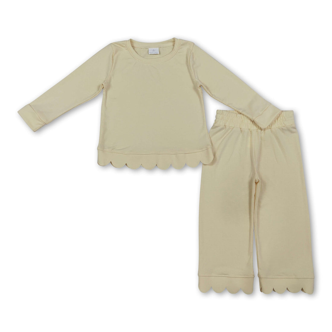 Yellow cotton girl long sleeves scallop pajamas set by Mini Rodeo, featuring a top and pants for fall comfort.