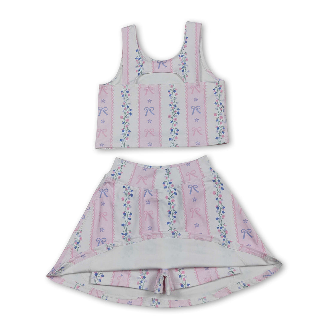 Pink floral girl’s sleeveless top and skirt set by Mini Rodeo, featuring bow accents and short sleeves for active wear.