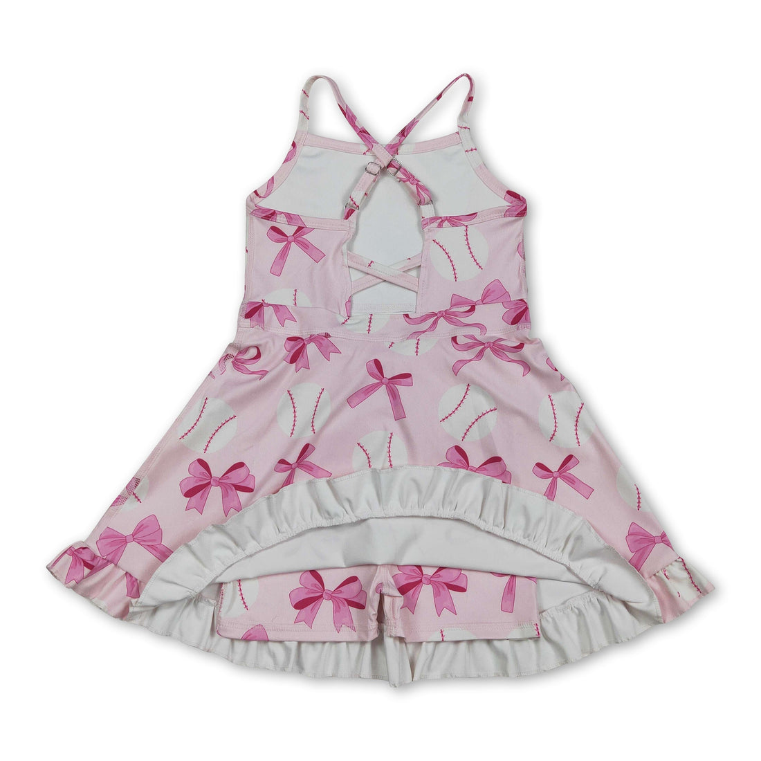 Pink bow baseball dress for girls, short sleeve summer athletic dress by Mini Rodeo with straps and playful design.