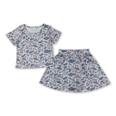 Grey camouflage short-sleeve top and skorts set for girls, kids summer clothing by Mini Rodeo, casual and comfortable outfit.