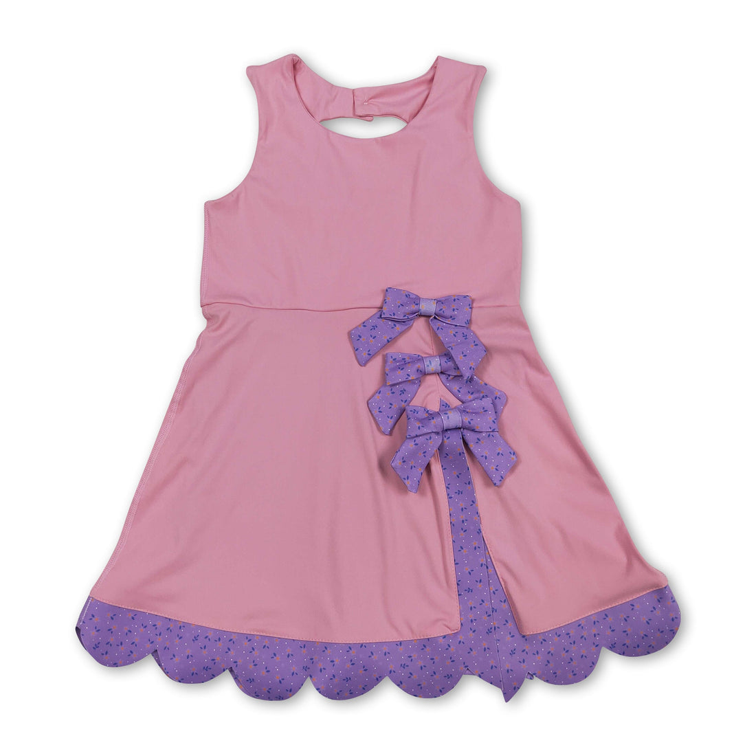 Pink sleeveless floral bow summer dress for girls by Mini Rodeo, featuring a short sleeve design and playful floral pattern.