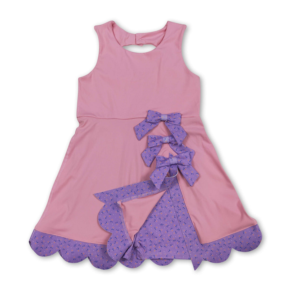 Pink sleeveless floral bow summer dress for girls by Mini Rodeo, featuring a short sleeve design and playful floral pattern.