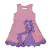 Pink sleeveless floral bow summer dress for girls by Mini Rodeo, featuring a short sleeve design and playful floral pattern.
