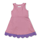 Pink sleeveless floral bow summer dress for girls by Mini Rodeo, featuring a short sleeve design and playful floral pattern.