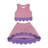 Girl sleeveless crop top and bow skirt activewear set by Mini Rodeo, featuring a short-sleeve top and matching skirt.