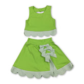 Lime green sleeveless bow scallop kids girls active wear set with short sleeve top and skirt by Mini Rodeo, perfect for active play.