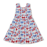 Sleeveless floral flag bow girls 4th of July athletic dress by Mini Rodeo with short sleeves and patriotic print.
