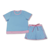 Light blue and pink cotton women’s set with top and skirt by Mini Rodeo, casual adult outfit displayed in the image.
