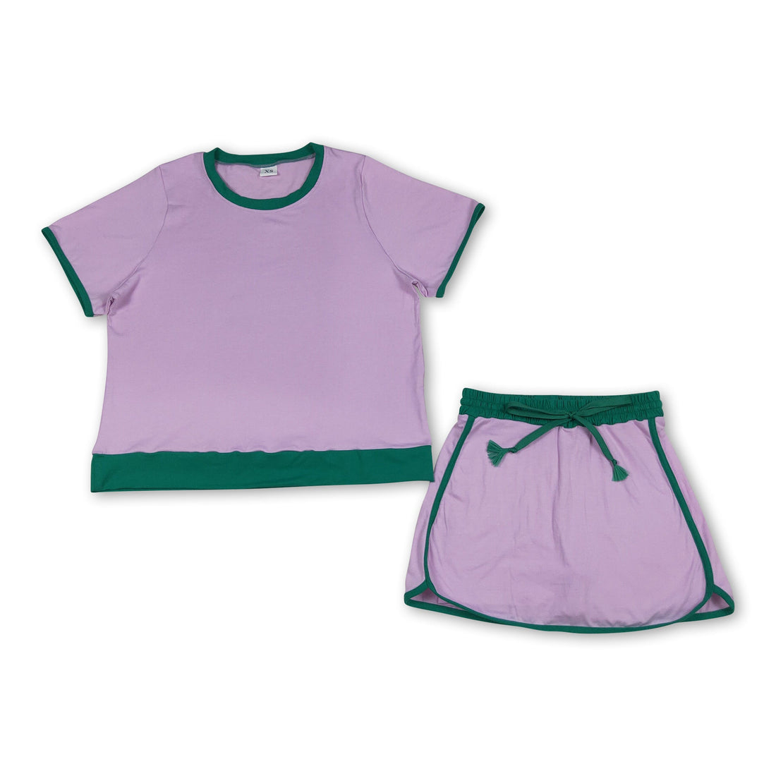 Pink and green cotton women’s top and skirt set by Mini Rodeo, casual adult outfit with trendy style, shown on a model.