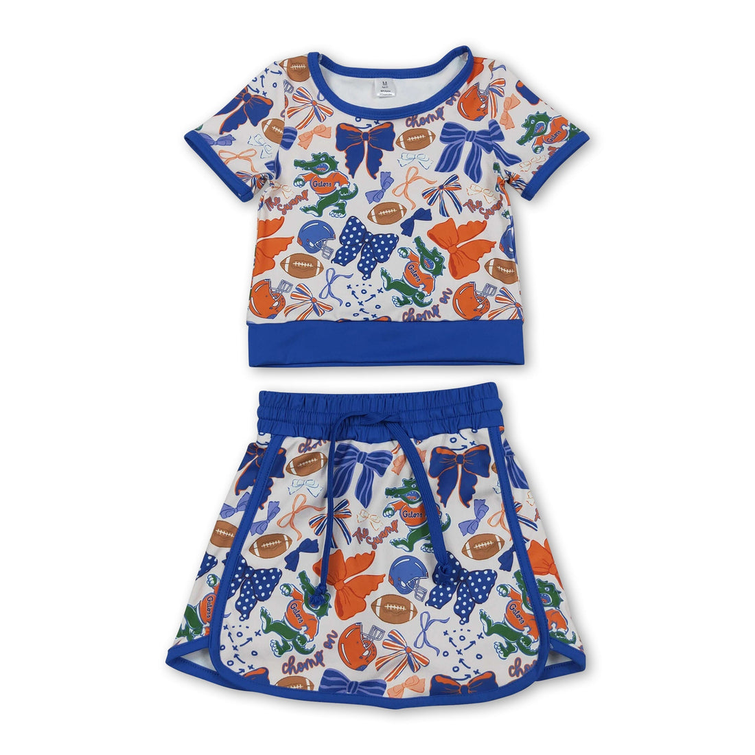 Blue bow crocodile girl active wear set with short sleeve top and skirt from Mini Rodeo, perfect for team sports or casual wear.