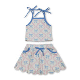 Light blue straps bow top and skirt set for girls by Mini Rodeo, featuring a short-sleeve top and matching skirt for active wear.