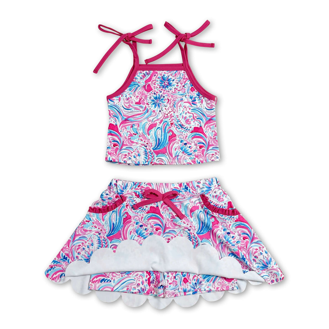 Hot pink watercolor girl’s short sleeves top and skirt set by Mini Rodeo, vibrant active outfit for kids and girls.