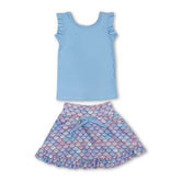 Light blue sleeveless girl’s activewear set with mermaid scale skirt and short sleeves, featuring a comfortable top and fun skirt design.