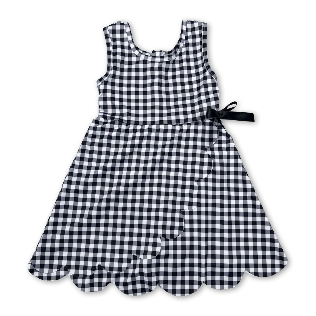 Sleeveless black plaid scallop athletic dress for girls by Mini Rodeo, featuring short sleeves and a playful scalloped hem.