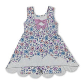 Kids girls sleeveless floral scallop summer athletic dress by Mini Rodeo, featuring a short sleeve design with vibrant floral patterns.