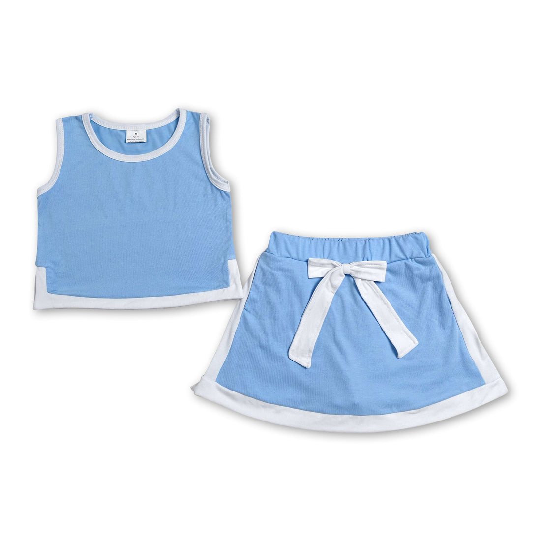 Light blue and white sleeveless girl’s top and skirt set by Mini Rodeo, featuring a short-sleeve top and coordinating skirt for kids.