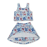 Red and blue bow top with matching skirt set for girls, 4th of July active wear from Mini Rodeo, short sleeves and playful style.