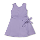 Lavender sleeveless athletic dress for girls by Mini Rodeo, featuring a bow and short sleeves, perfect for active kids.