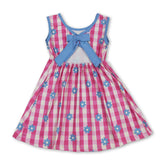 Hot pink plaid floral sleeveless kids girls dress by Mini Rodeo, featuring a short sleeve design with vibrant pattern and floral details.