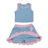 Light blue and pink scallop active wear set for girls, includes sleeveless top and skirt by Mini Rodeo.