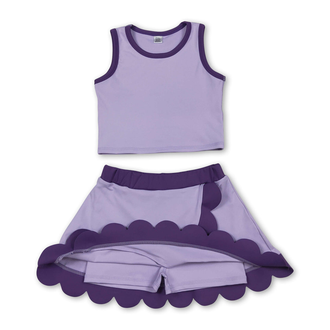 Lavender purple scallop active wear set for girls by Mini Rodeo, includes short sleeve top and skirt, perfect for kids&