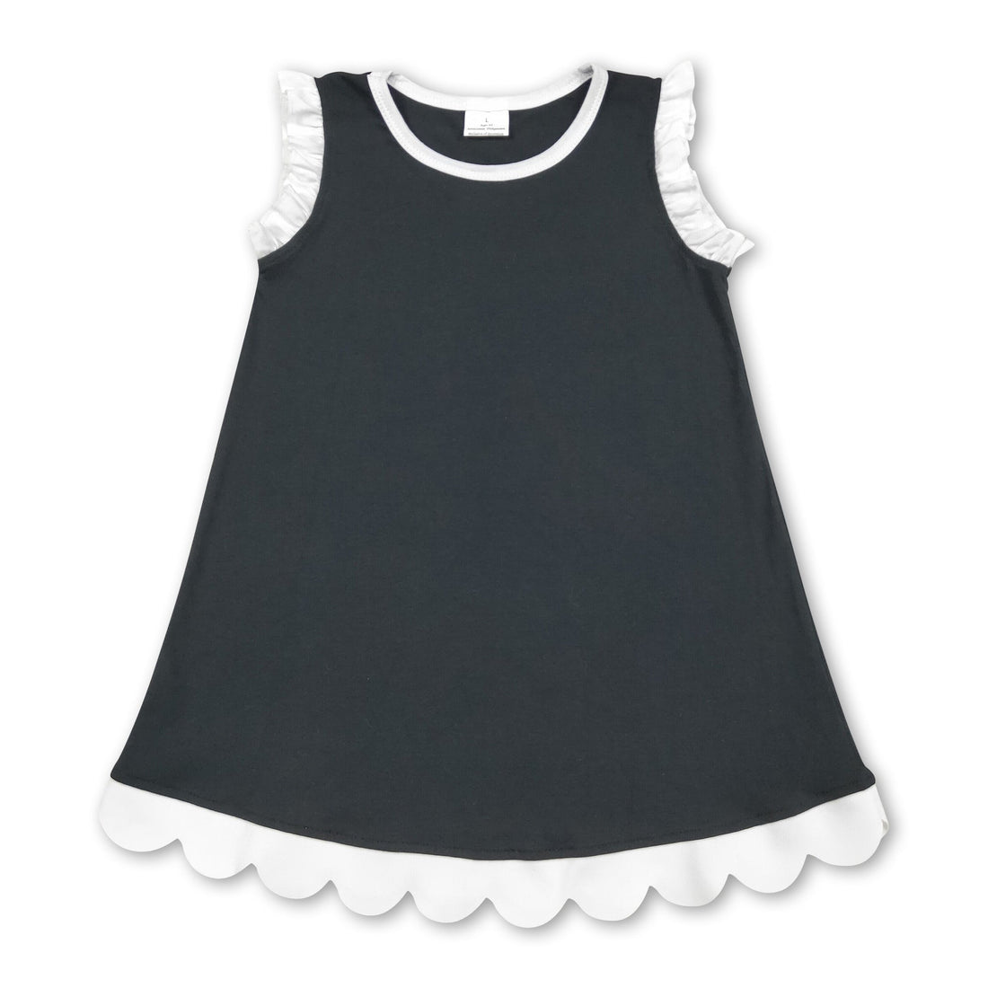White scallop ruffle sleeveless cotton dress for girls by Mini Rodeo, featuring short sleeves and a stylish black and white design.