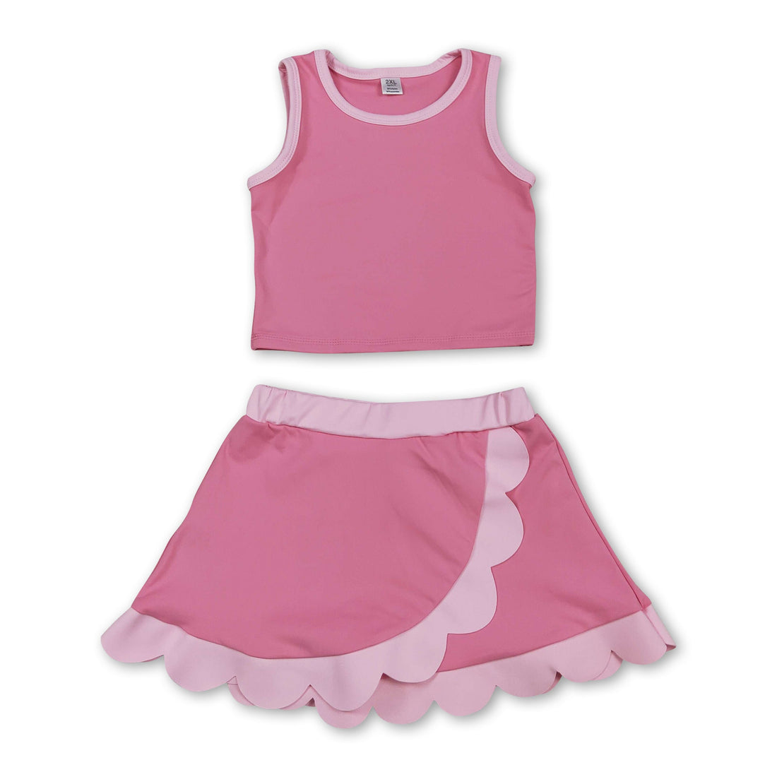 Light pink scallop princess girls summer active wear set with short sleeve top and skirt by Mini Rodeo, perfect for warm weather.