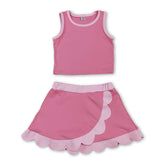Light pink scallop princess girls summer active wear set with short sleeve top and skirt by Mini Rodeo, perfect for warm weather.