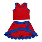 Girl short sleeves top and skirt set in red and blue scallop design, summer active wear by Mini Rodeo.