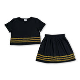 Black short sleeve cotton top and skirt set for girls by Mini Rodeo, perfect for team outfits and casual wear.