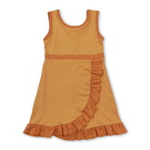Yellow sleeveless scallop dog print kids girls athletic dress by Mini Rodeo, featuring a short sleeve design and playful pattern.