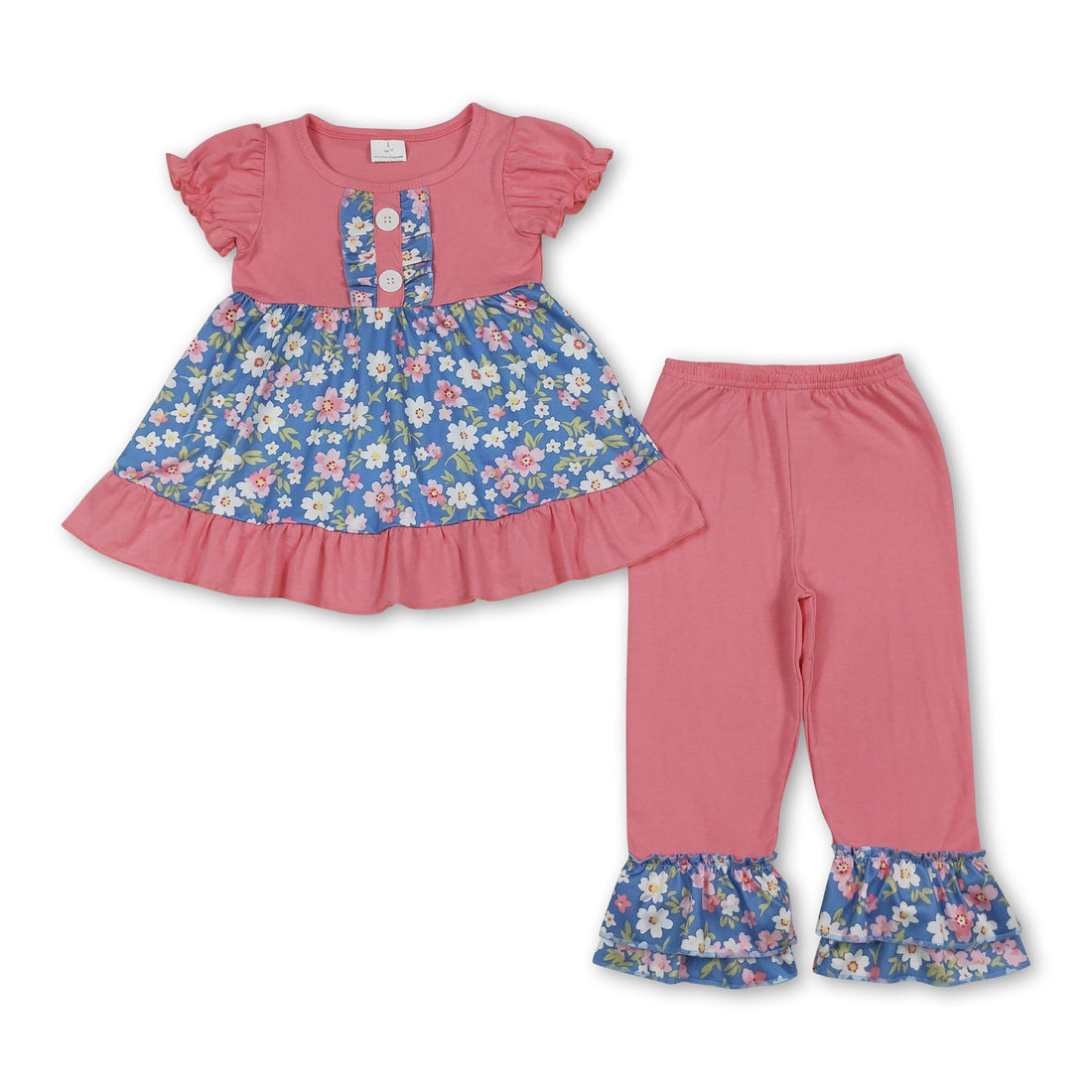 Pink floral girl’s short sleeves tunic and ruffle pants set by Mini Rodeo, featuring a cute, casual outfit for girls.