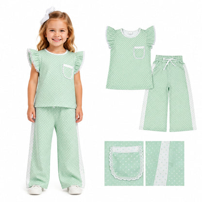 Green polka dot girl short sleeves top and pants set by Mini Rodeo with flutter sleeves, perfect for casual girls&