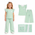 Green polka dot girl short sleeves top and pants set by Mini Rodeo with flutter sleeves, perfect for casual girls&