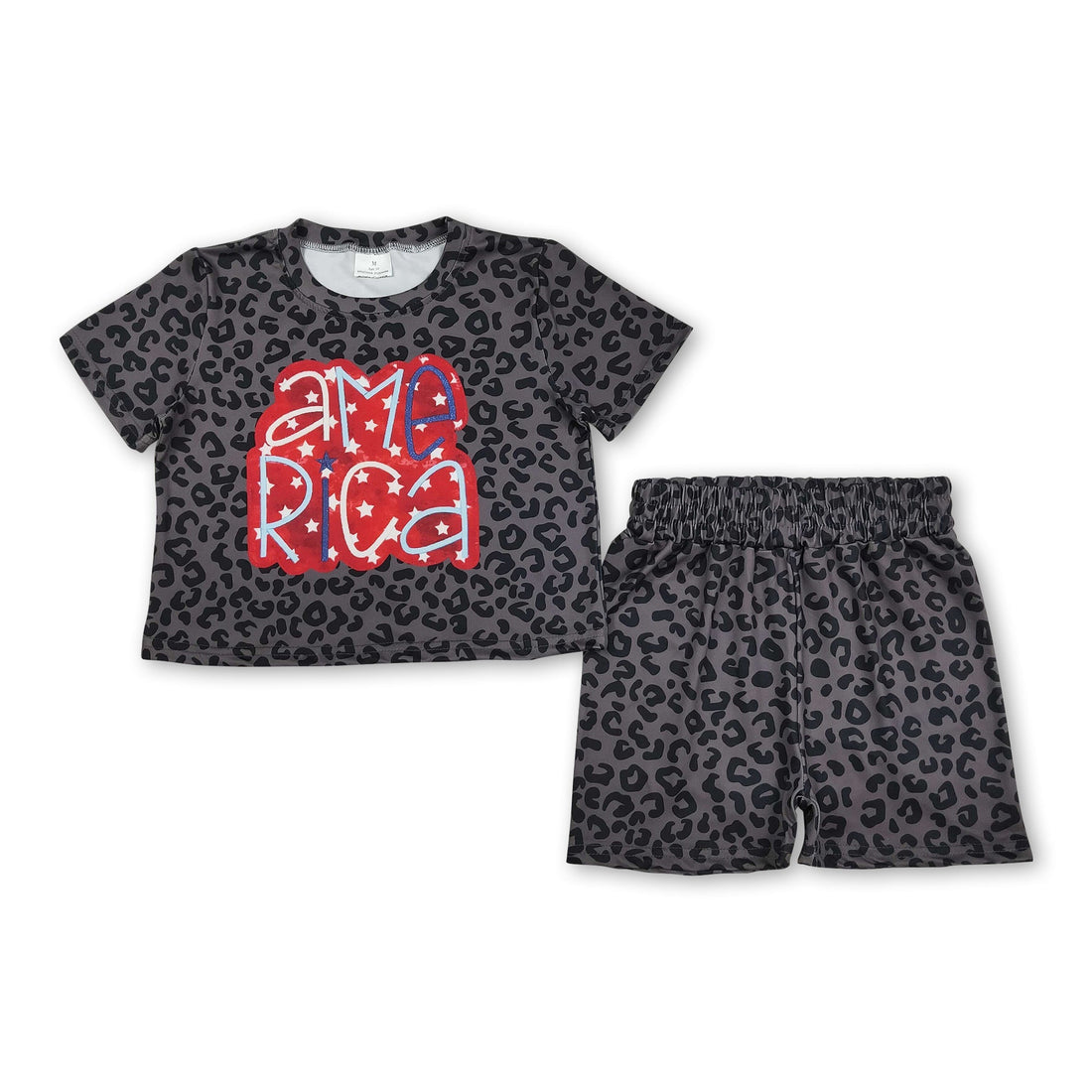 Black leopard print girl’s short sleeves top and shorts set by Mini Rodeo, perfect for 4th of July celebrations.